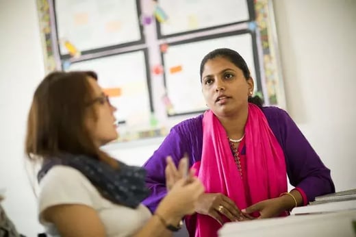 Image of two teachers in a class