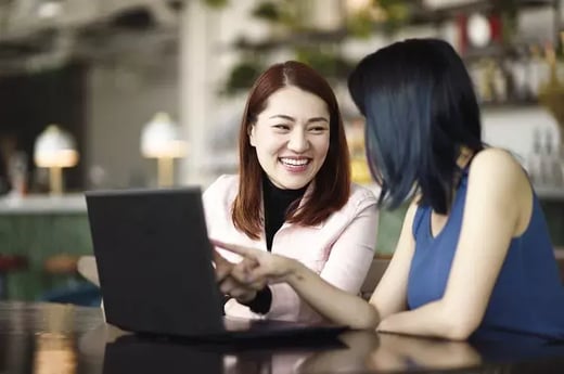 Photo of two teachers in a discussion